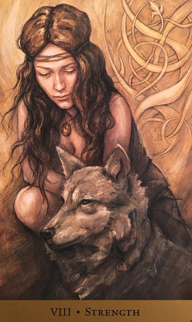 Strength, from the Tarot Of The Hidden Realm Oracle Card deck, by Julia Jeffrey and Barbara Moore